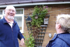 Bill enjoying showing a visitor his colony of red mason bees