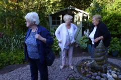 Enjoying a joke by the water feature